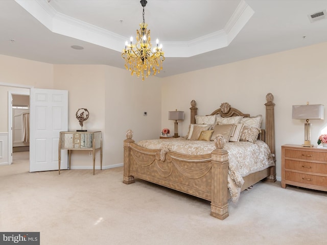 bedroom featuring a chandelier, light colored carpet, ornamental molding, and a raised ceiling