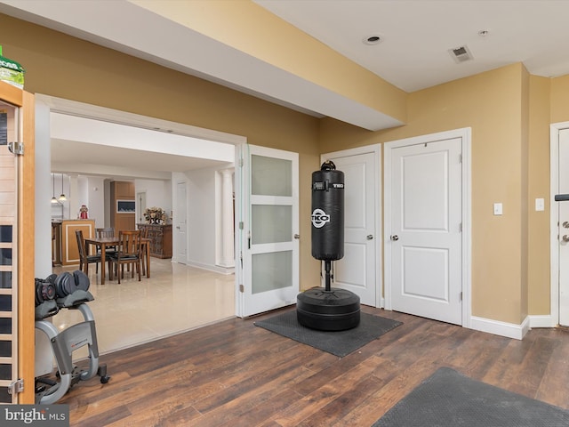 entrance foyer with dark hardwood / wood-style flooring