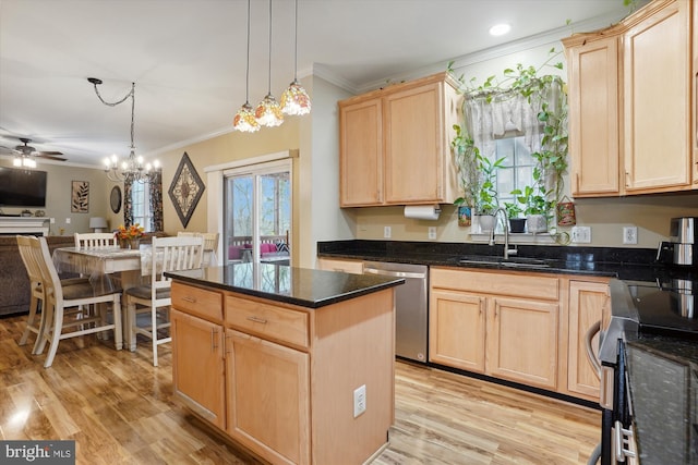 kitchen with pendant lighting, sink, light brown cabinetry, and dishwasher