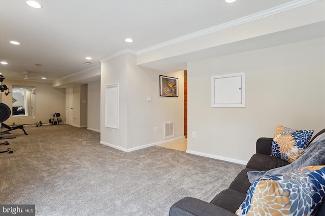 carpeted living room featuring ornamental molding