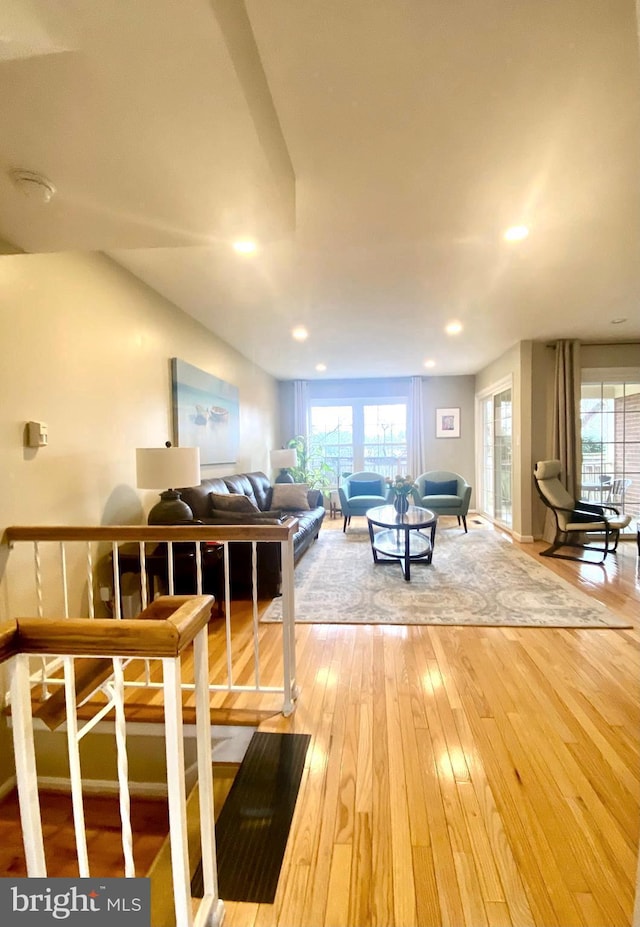 rec room with recessed lighting and wood finished floors