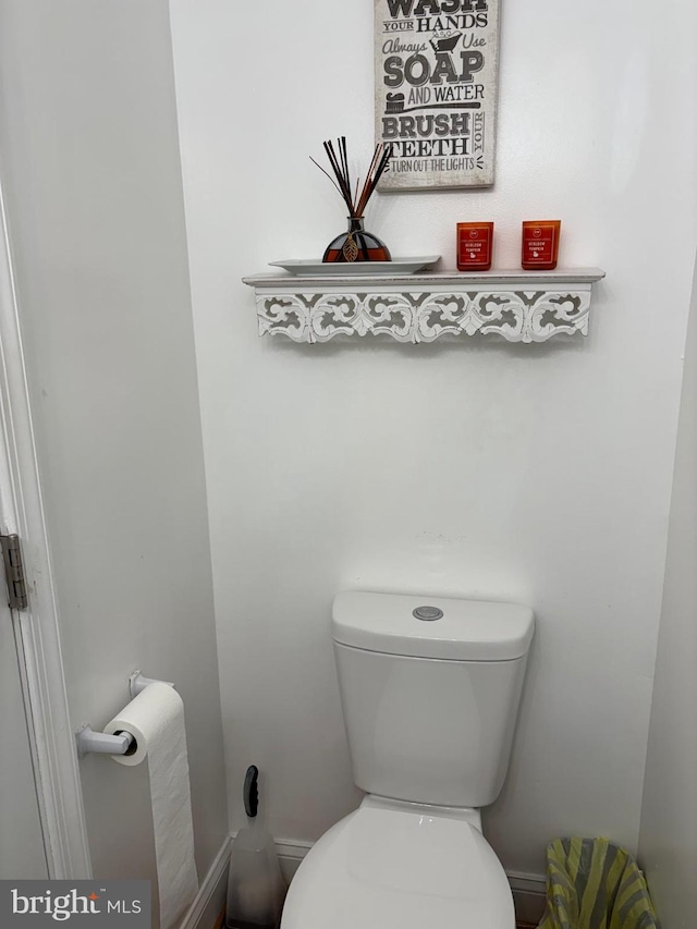 bathroom featuring toilet