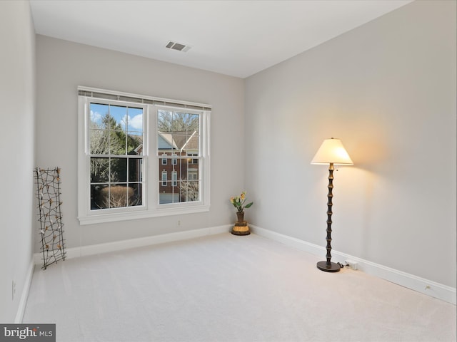 view of carpeted spare room