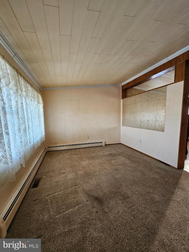 carpeted spare room with a baseboard radiator and wood ceiling