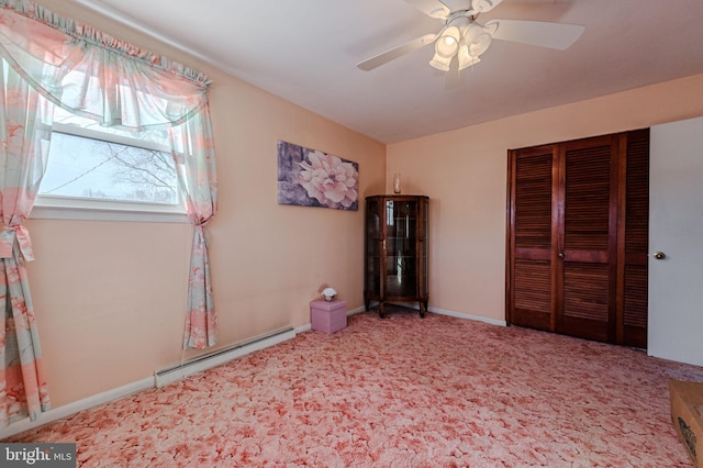 1 Keats Dr, Claymont, DE 19703 - unfurnished bedroom with ceiling fan, a baseboard radiator, carpet flooring, and a closet