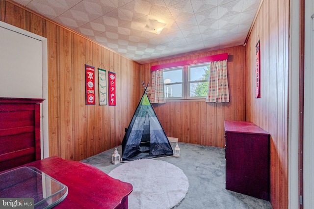 1 Keats Dr, Claymont, DE 19703 - recreation room featuring light colored carpet and wood walls