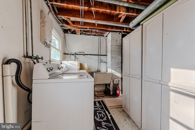 1 Keats Dr, Claymont, DE 19703 - laundry room featuring cabinets and washing machine and dryer