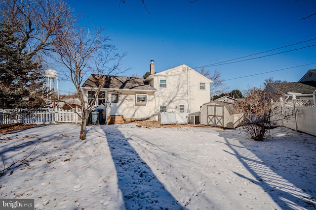 1 Keats Dr, Claymont, DE 19703 - snow covered house featuring central AC unit and a shed