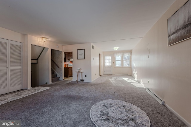 1 Keats Dr, Claymont, DE 19703 - unfurnished living room with baseboard heating and carpet flooring