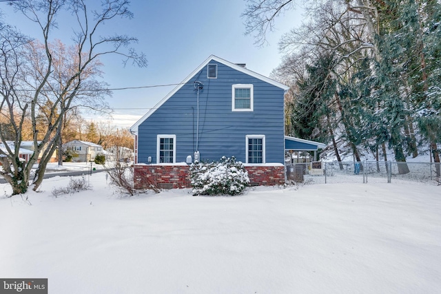 view of snow covered property