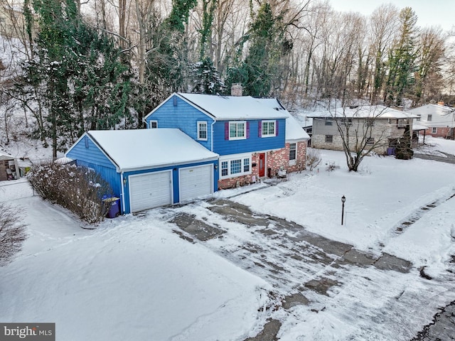 view of front of property with a garage