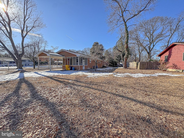 view of front of house with a carport