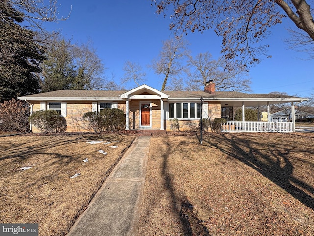 single story home featuring a carport