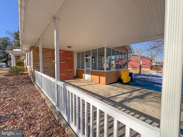 exterior space with a sunroom