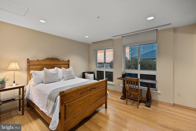 bedroom with light hardwood / wood-style flooring