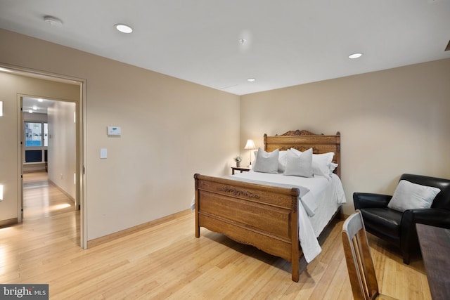 bedroom with light wood-type flooring