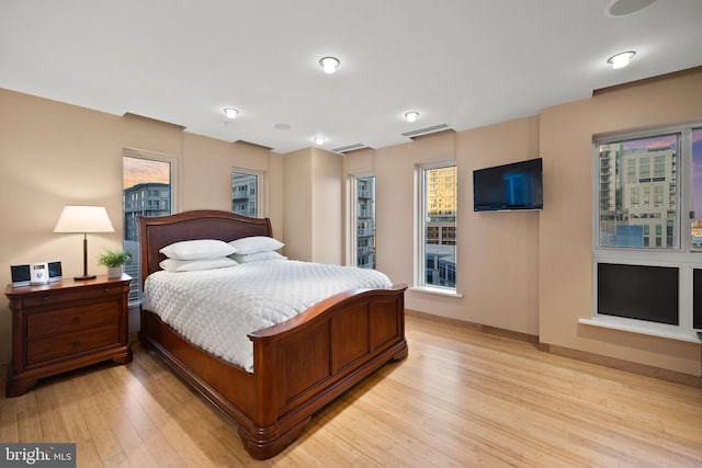 bedroom with light wood-type flooring