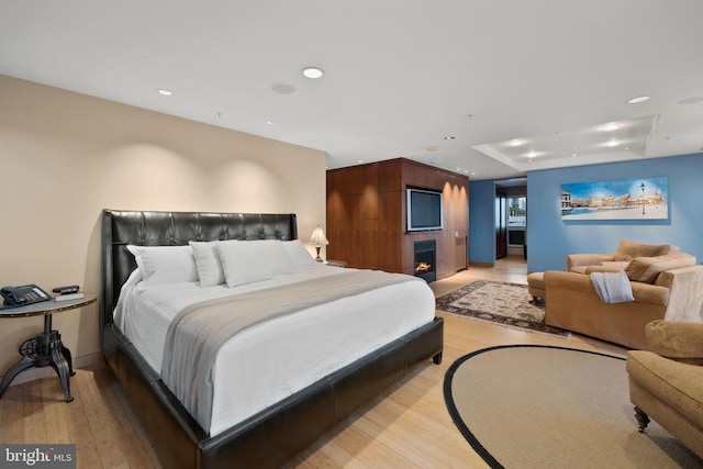 bedroom featuring light hardwood / wood-style floors