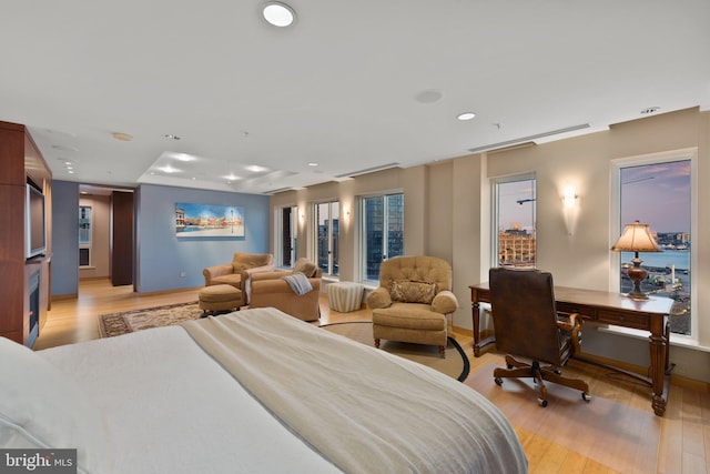 bedroom with light hardwood / wood-style floors