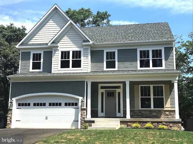 1394 B And A Blvd, Arnold, MD 21012 - craftsman-style house with covered porch, an attached garage, stone siding, and driveway