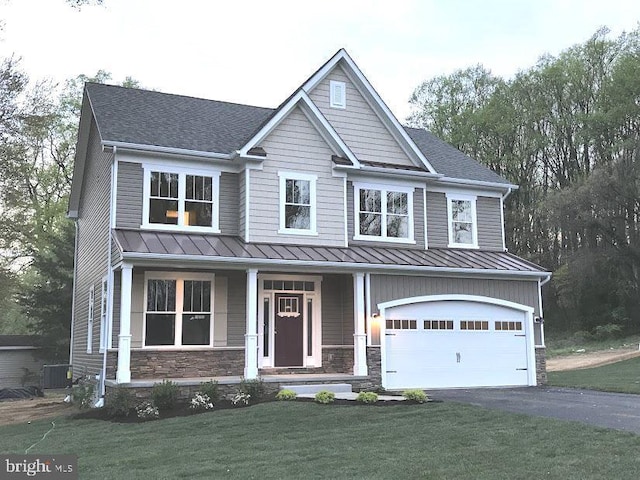 1394 B And A Blvd, Arnold, MD 21012 - craftsman inspired home featuring a standing seam roof, a garage, covered porch, asphalt driveway, and cooling unit