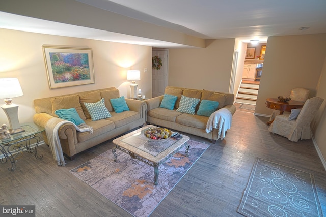 living room with dark hardwood / wood-style floors