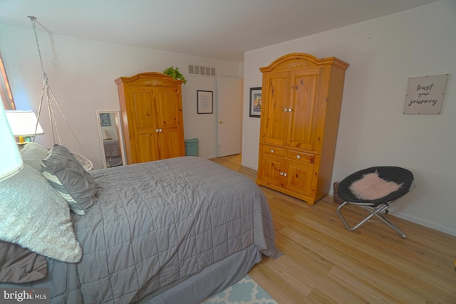 bedroom featuring light hardwood / wood-style flooring