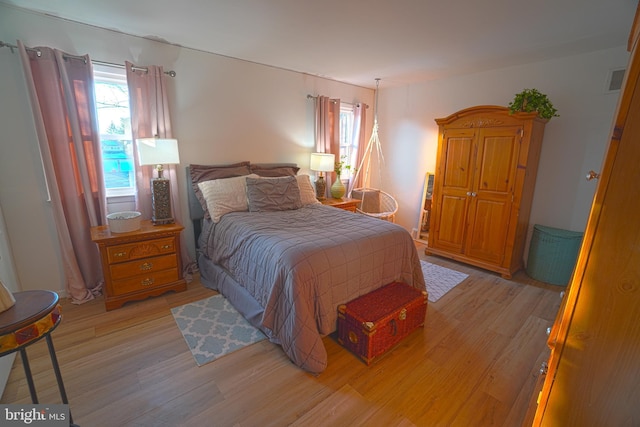 bedroom with light hardwood / wood-style floors