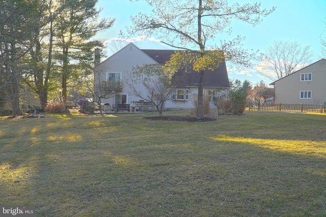 view of home's exterior featuring a lawn