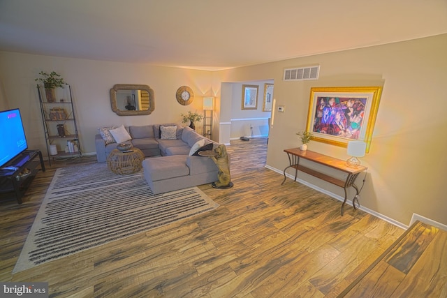 living room with hardwood / wood-style flooring