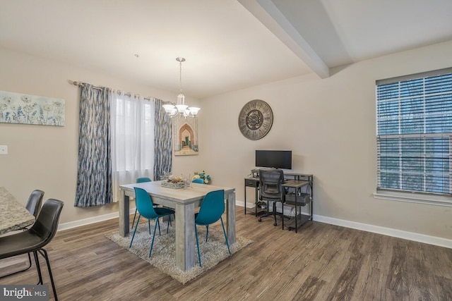 dining space featuring an inviting chandelier, dark hardwood / wood-style floors, and beamed ceiling