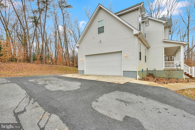 view of home's exterior with a garage