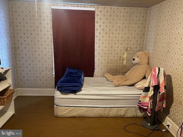 bedroom featuring hardwood / wood-style floors