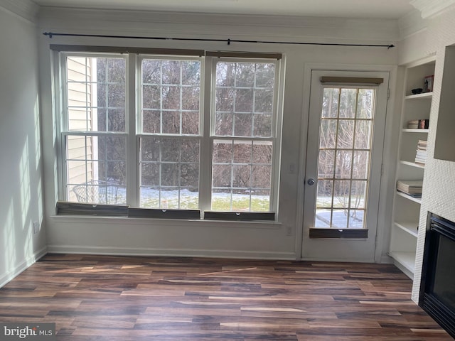 entryway featuring built in features and dark hardwood / wood-style floors