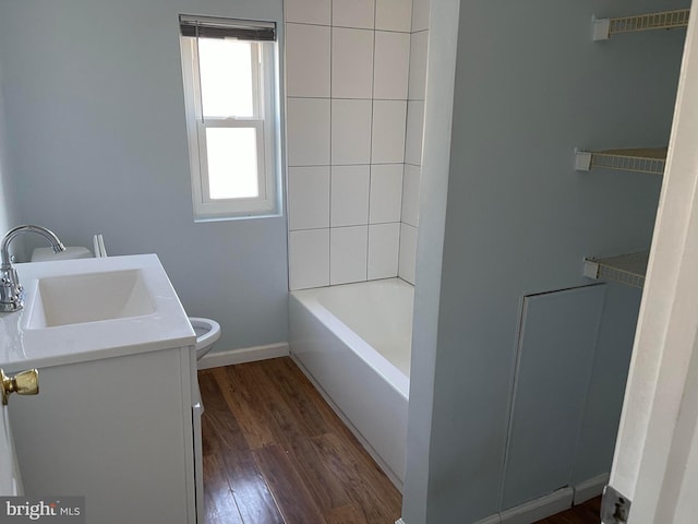 full bathroom with vanity, toilet, shower / washtub combination, and wood-type flooring