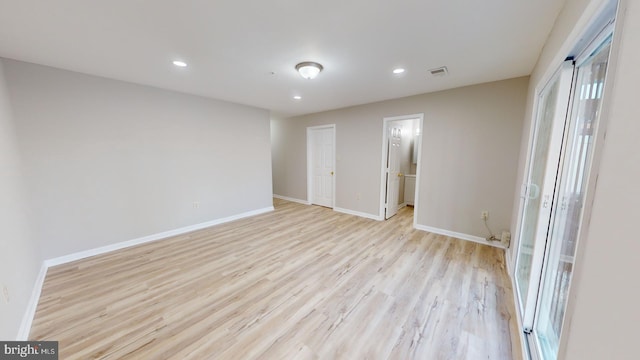 empty room featuring light hardwood / wood-style floors