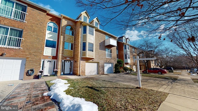 view of building exterior featuring a garage