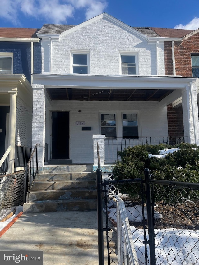 multi unit property featuring covered porch