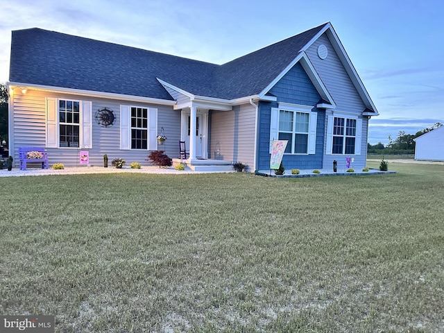 view of front of home featuring a front yard