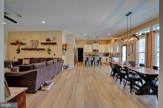 living room with light wood-type flooring