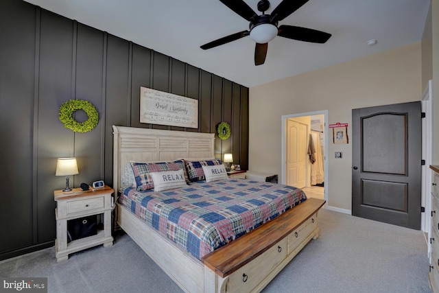 bedroom featuring light carpet and ceiling fan