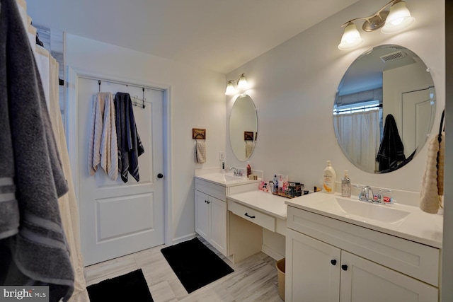 bathroom featuring vanity