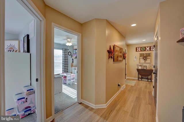 corridor featuring light hardwood / wood-style flooring