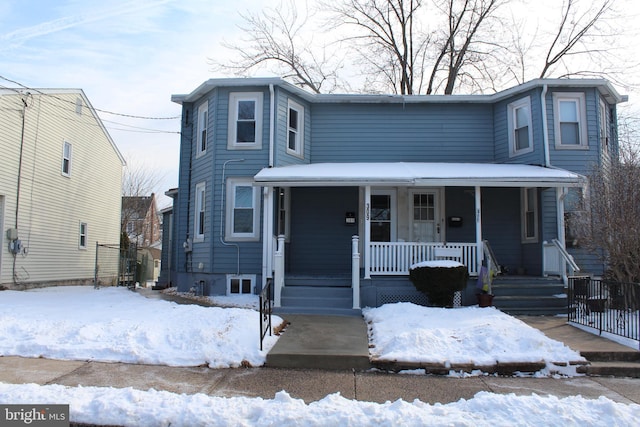 front of property featuring a porch