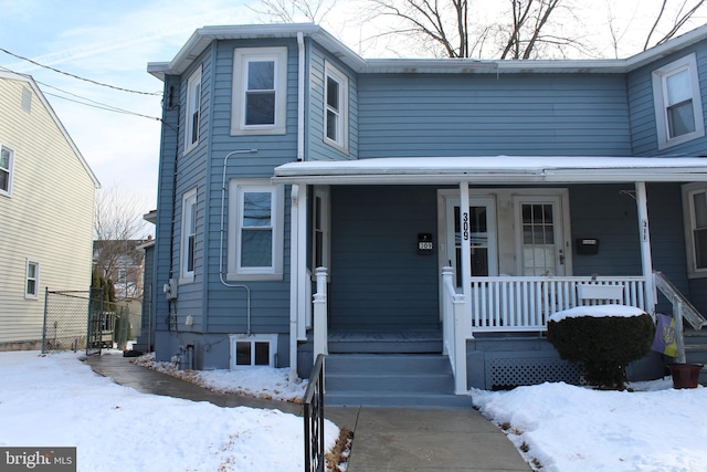 view of front property with covered porch