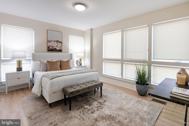 bedroom featuring hardwood / wood-style floors