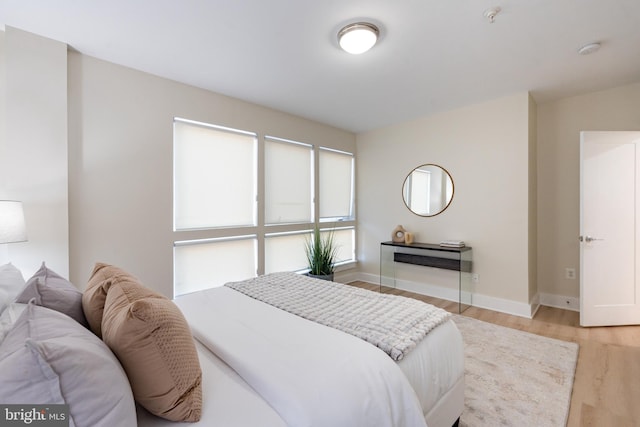 bedroom featuring light wood-type flooring