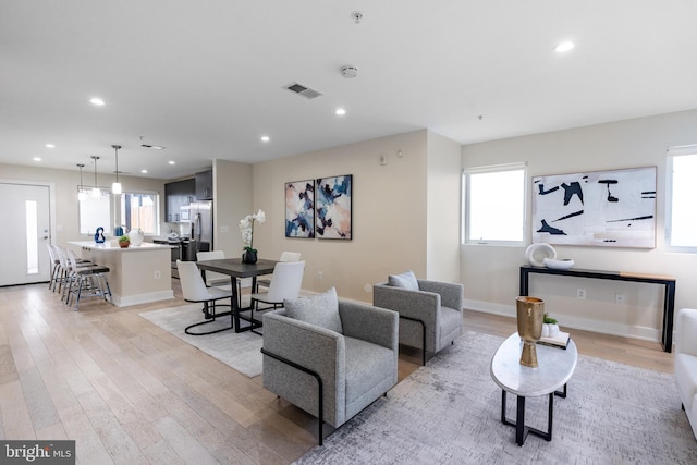 living room with light wood-type flooring