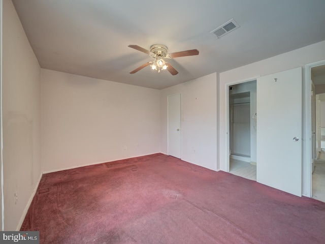 unfurnished bedroom featuring a closet, ceiling fan, and carpet flooring