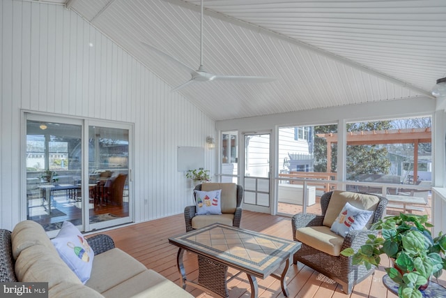 sunroom / solarium featuring vaulted ceiling and ceiling fan